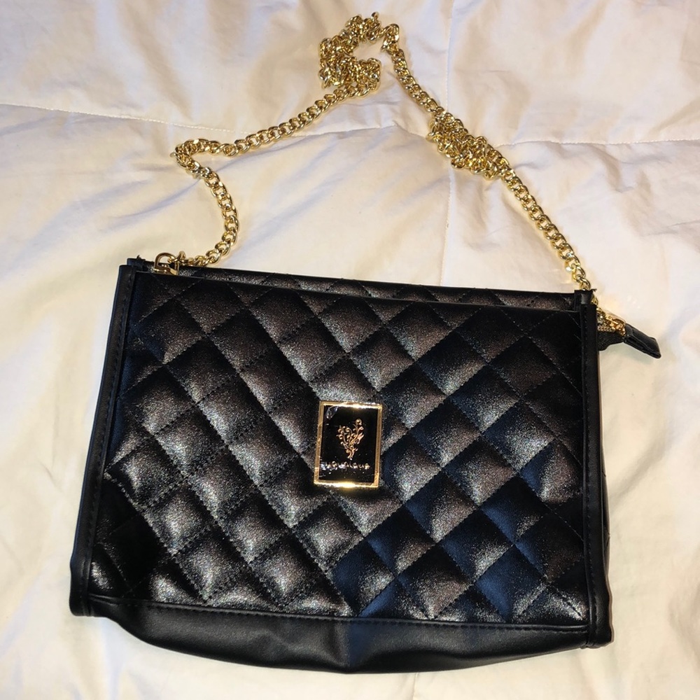 Quilted black clutch